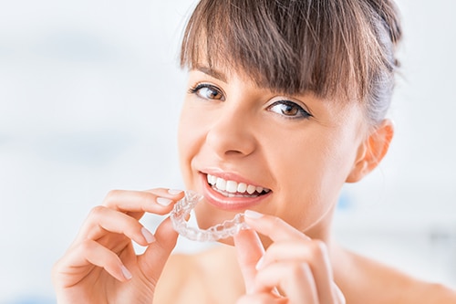 Today's Adult Has the Option of Invisalign Clear Aligners - Maddux  Orthodontics