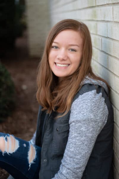 Maddux orthodontics patient success teenage girl after treatment