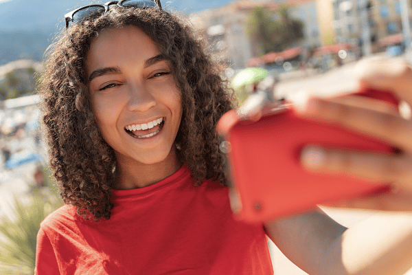 teen taking selfie for orthodontic consultation