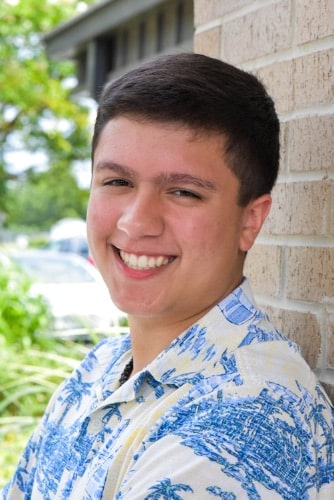Maddux orthodontics patient teenage guy smiling after treatment