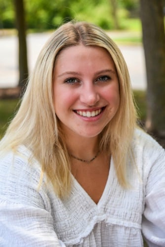 Maddux orthodontics young woman patient smiling