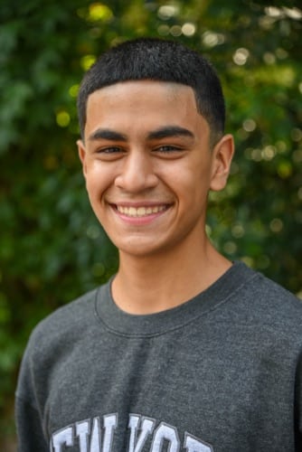 Maddux orthodontics patient smiling after treatment