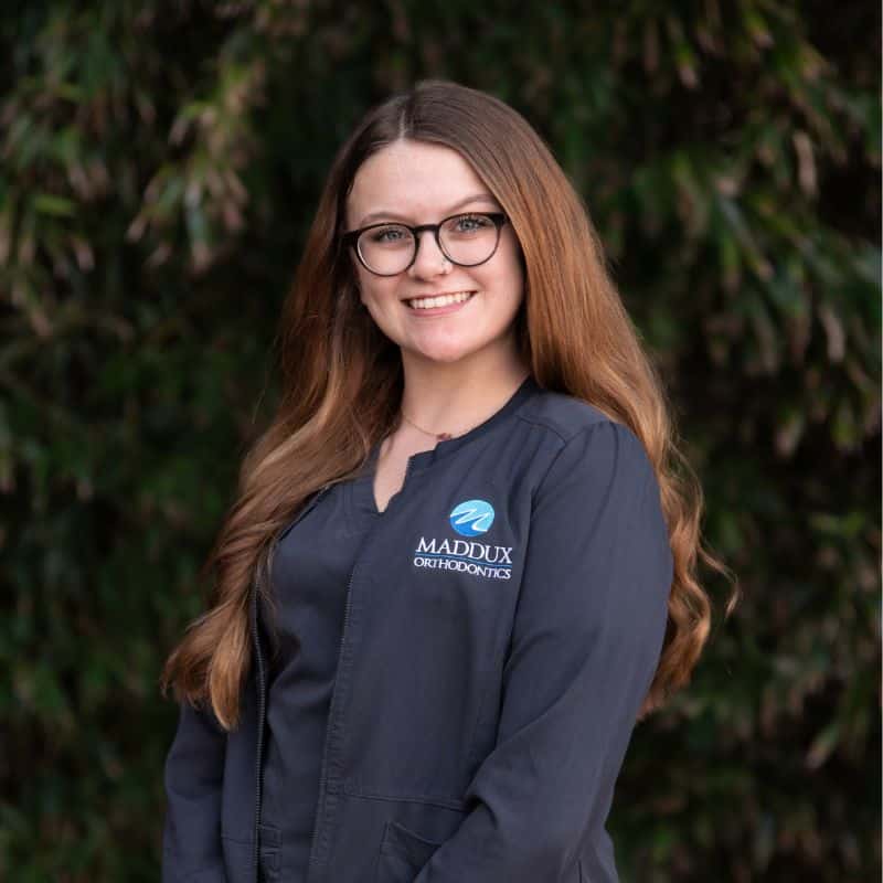 Emma, clinical technician, assisting with patient care at maddux orthodontics