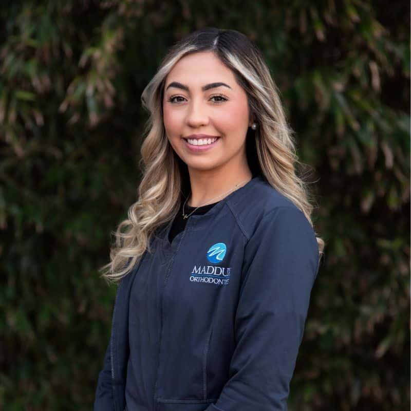 Jaylynn, sterilization technician, preparing orthodontic instruments at maddux orthodontics